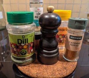 A collection of containers of all the ingredients listed in the "dry seasoning ingredients" section above