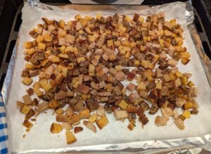 Lightly toasted bread on the baking sheet.