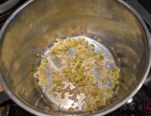 Fried onion, celery, and garlic in the bottom of the pot.