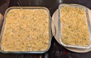 Casseroles now topped evenly with the seasoned breadcrumbs.