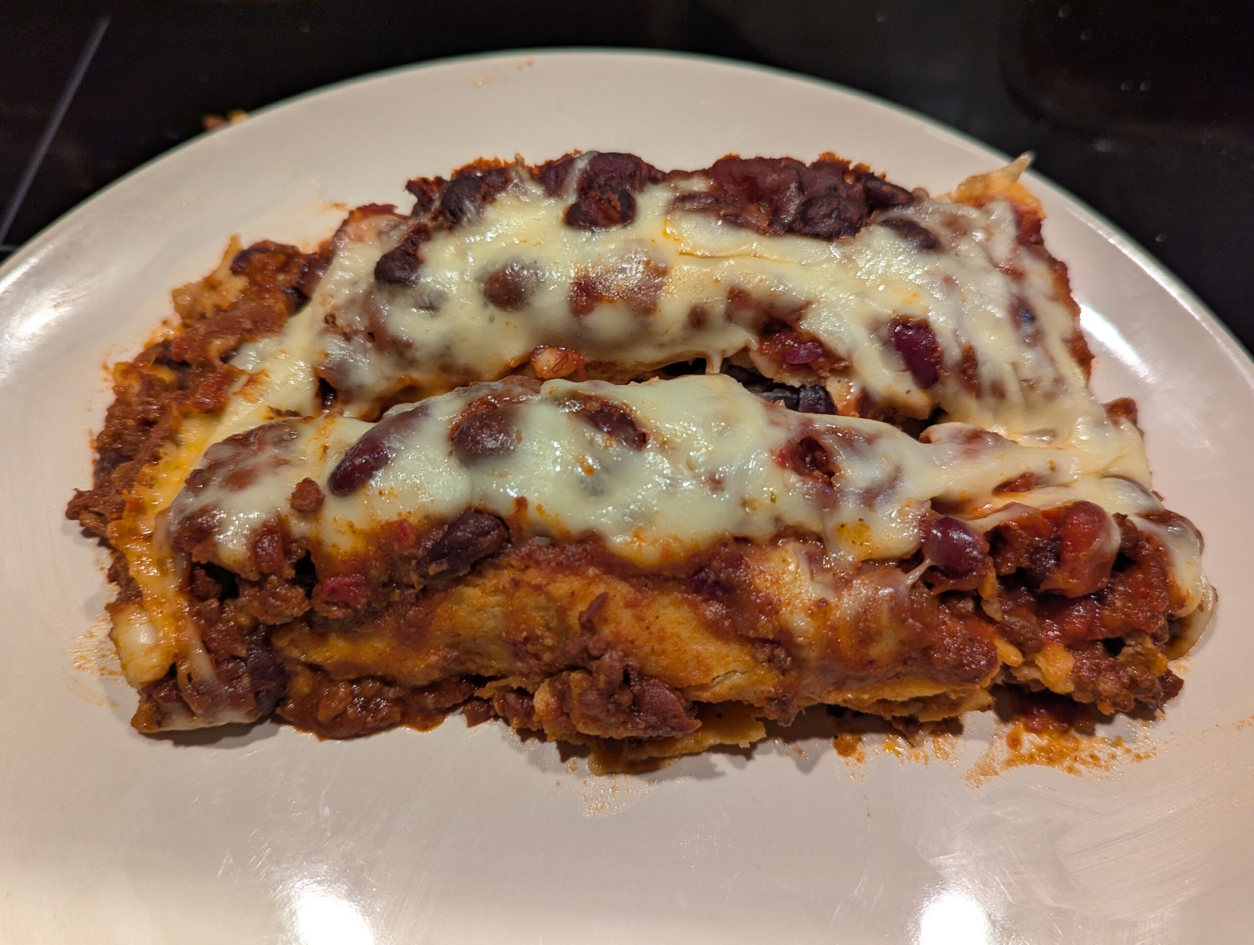 Leftover chili-smothered enchiladas