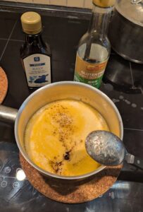 A saucepan with ingredients before thickening