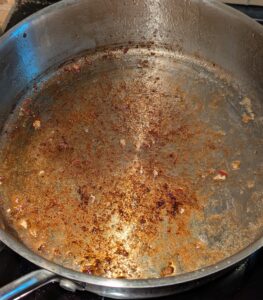 Browned crust in the bottom of the pan