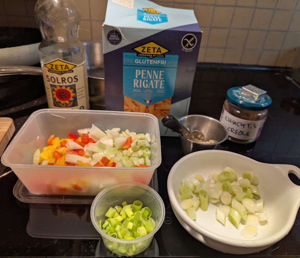 The pasta, chopped vegetables, and most seasonings