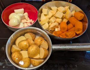 Cut up root vegetables for the stew