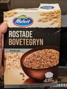 Box of Melvit brand roasted buckwheat in boil-in-bag pouches