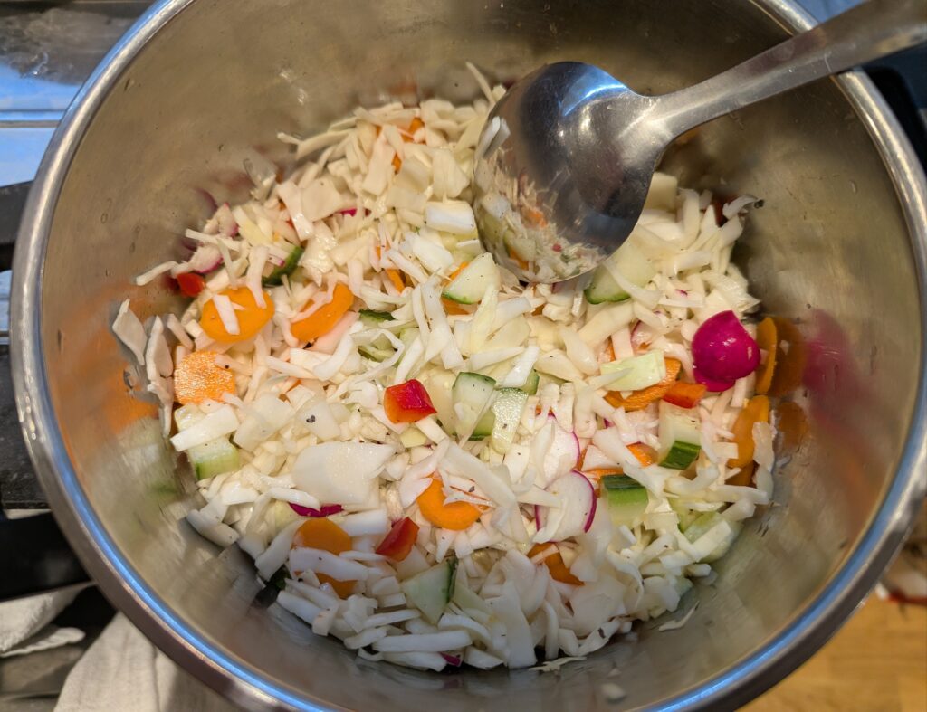 Salad vegetables in a mixing bowl