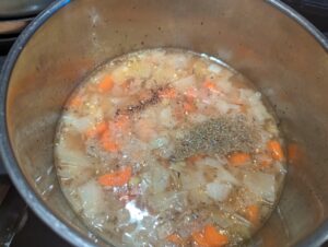 Marjoram and garlic powder added to the soup