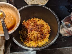 Liquid and seasoning sauce poured over the pasta