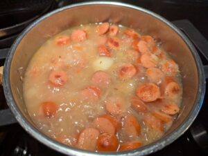 The cooked soup with kraut, before the sour cream and finishing touches are added.