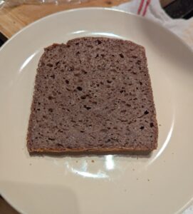 Slice of fresh bread on a small plate
