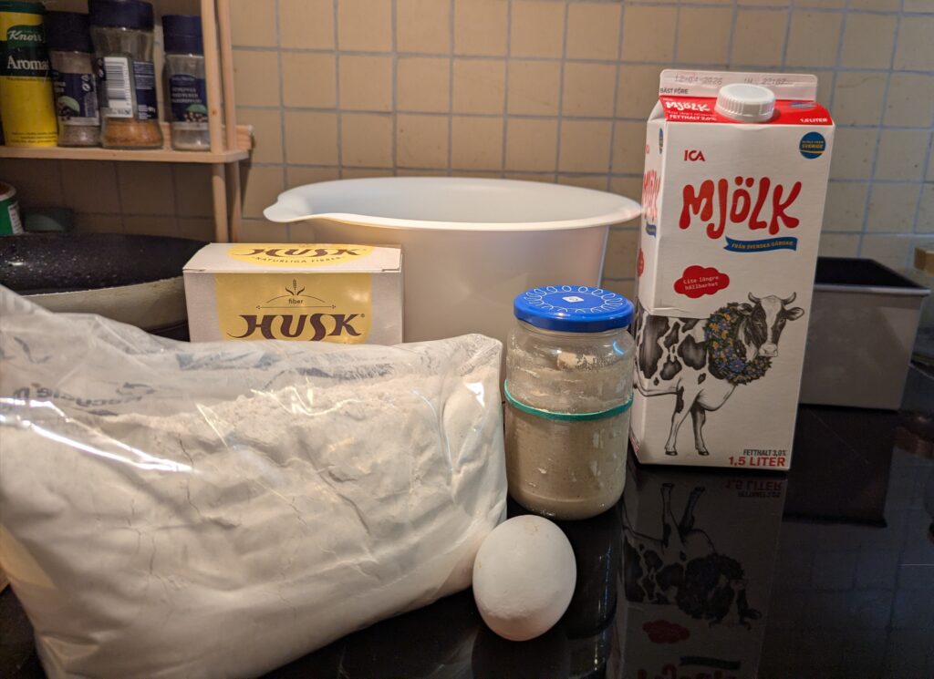 Major ingredients for the recipe, with the mixing bowl and pan